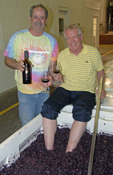 Tumbleweed Smith stomping grapes at Llano Estacado Winery with winemaker Greg Bruni